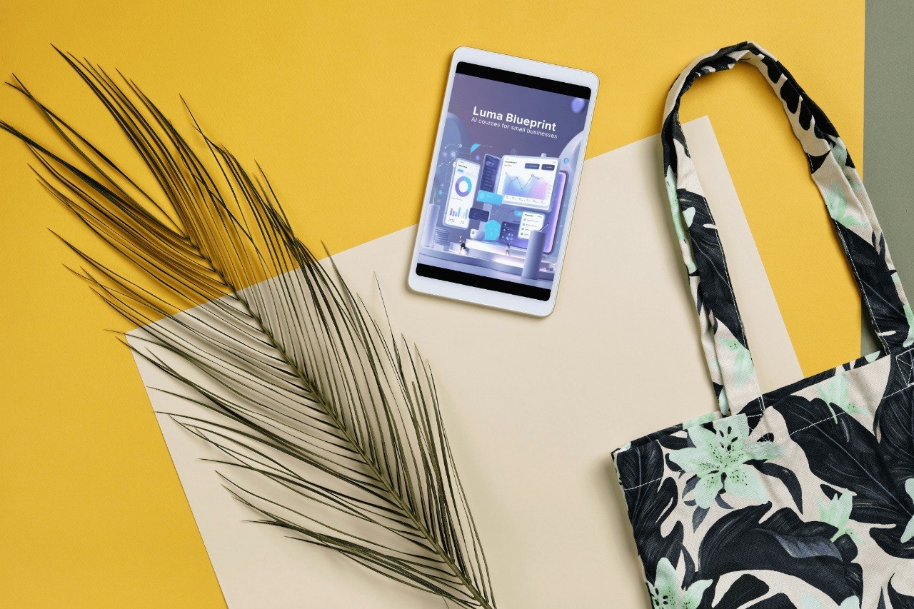 Phone with app interface on a yellow background with a floral-patterned bag and palm leaf.